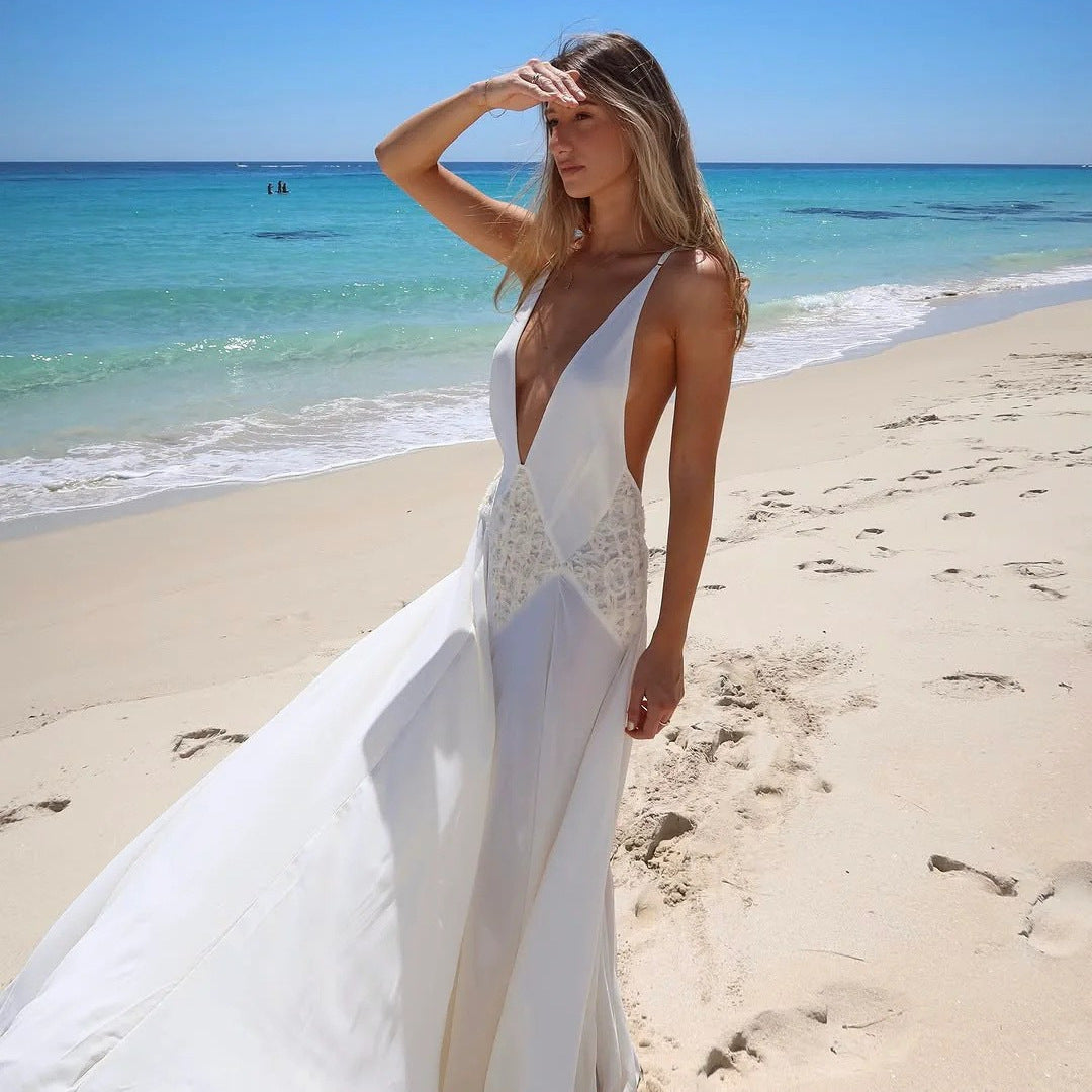 Women’s long sleeve maxi dress with a refined V-neckline and artistic lace ornament Lune London