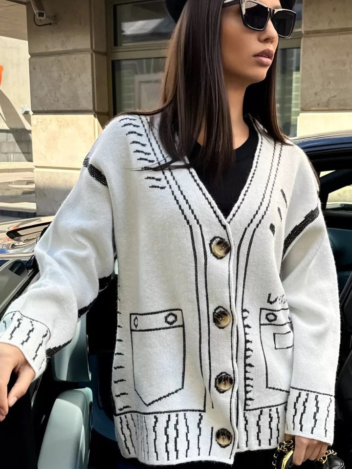 Designer knit jacket for women with a striking geometric pattern and big buttons Lune London