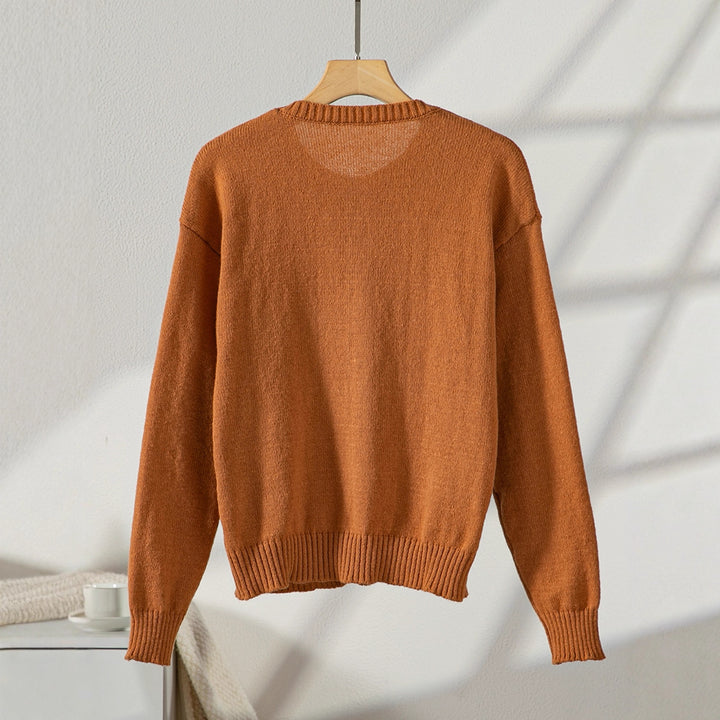 Elegant ladies cardigan with button details and practical pockets Lune London