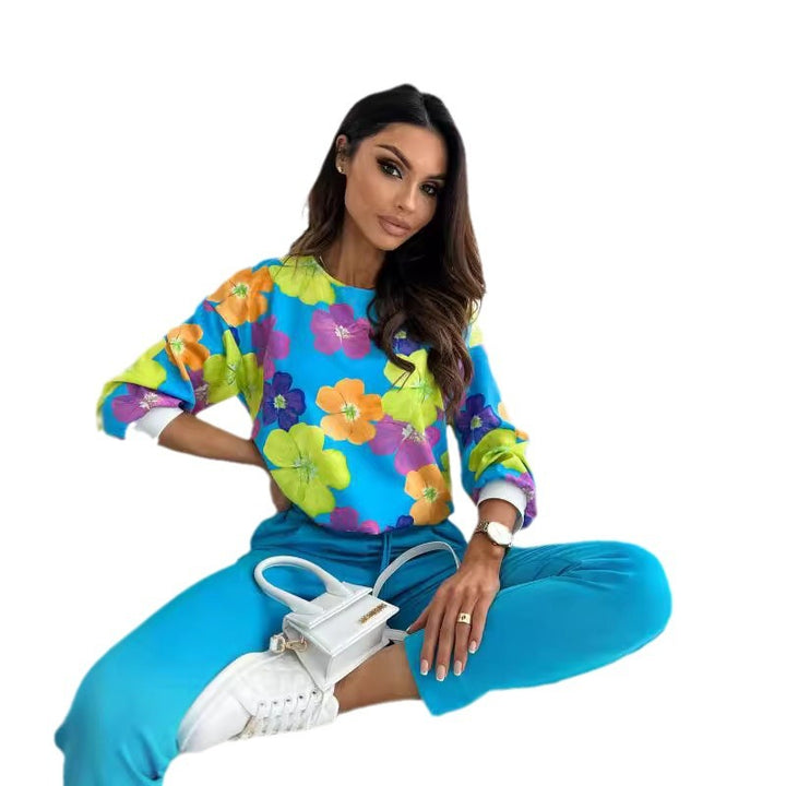 Casual women's sweatshirt with a colorful floral pattern and drop shoulders Lune London