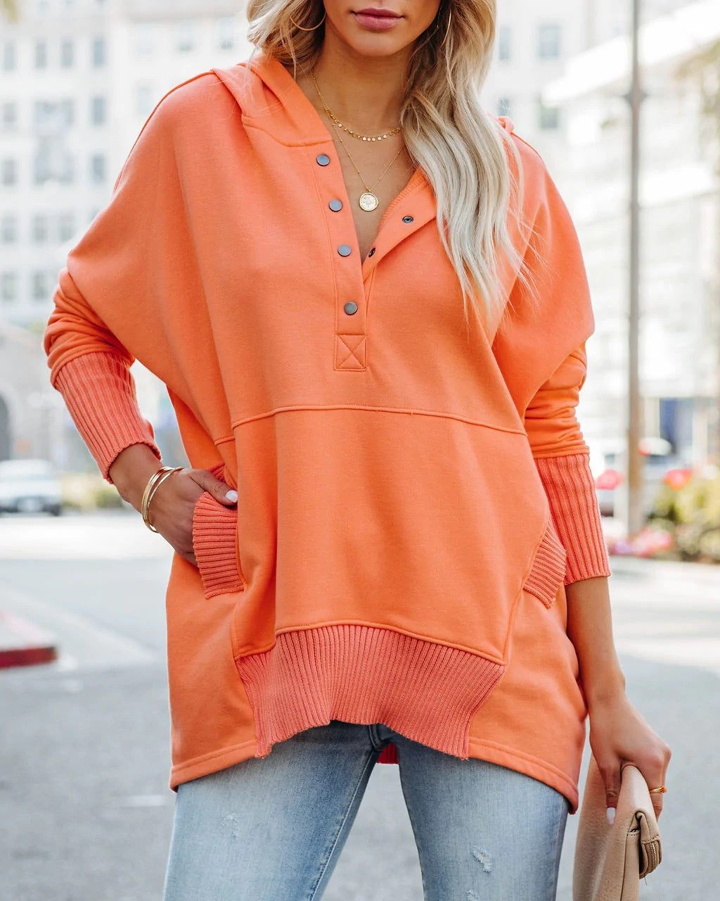 Casual sweater for women with button placket and hood Lune London