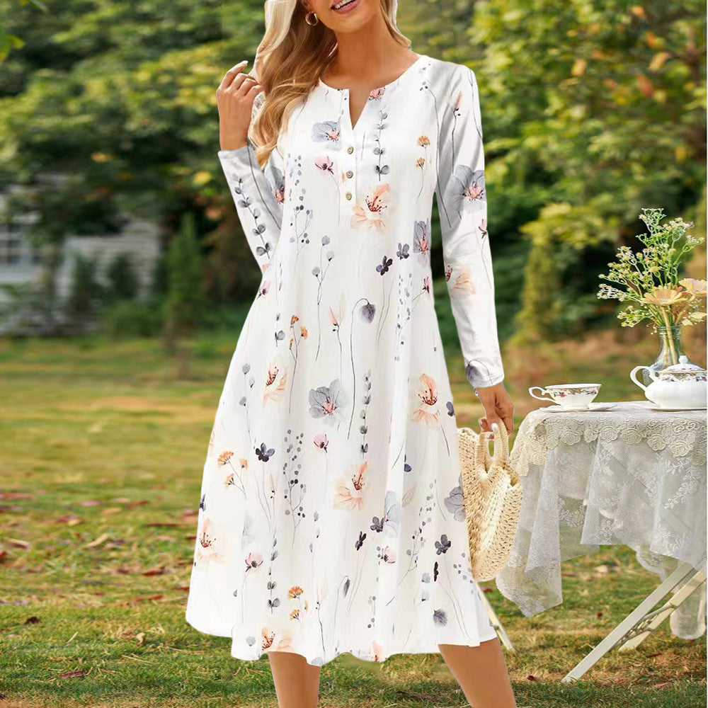 Long sleeve dress for women with a floral design and a button closure all the way down Lune London