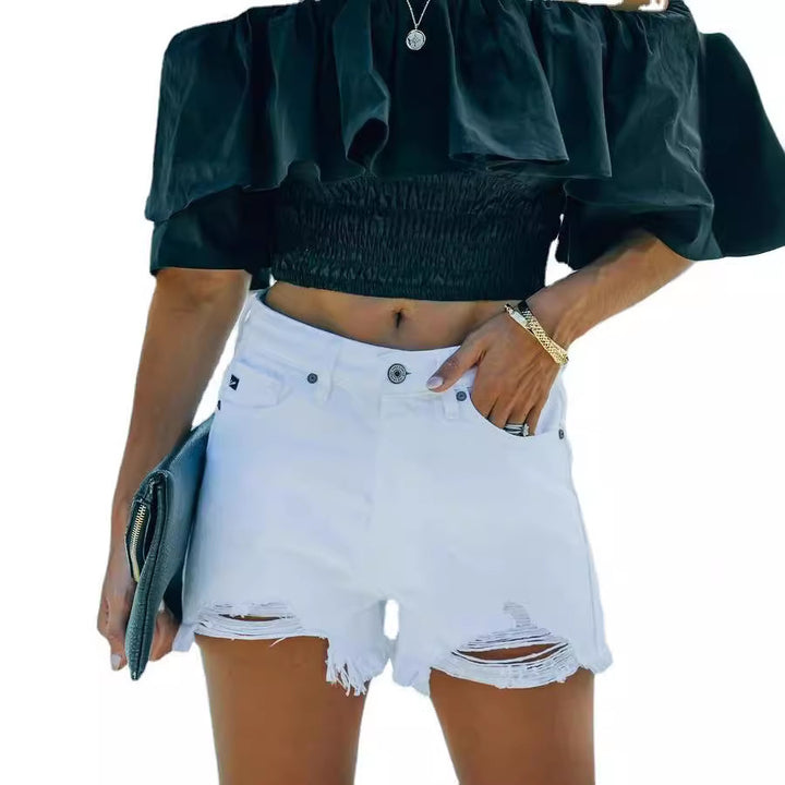 Denim shorts for women in a casual destroyed style with frayed hem Lune London