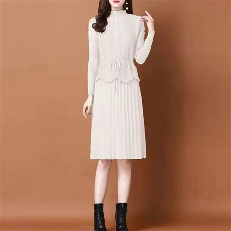 Knit dress for ladies with asymmetrical waist and fine ribbed structure Lune London