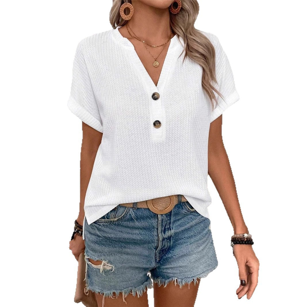 Casual short sleeve t-shirt for women with a decorative button placket design and a chic honeycomb texture
