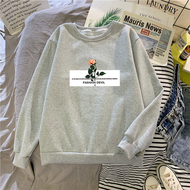 Women’s sweatshirt with floral motif Chic & Stil