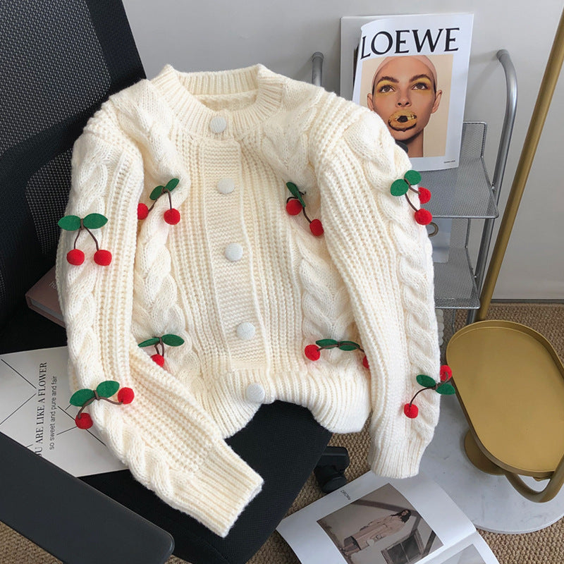 Women's chunky knit sweater with floral appliqués and button details Lune London
