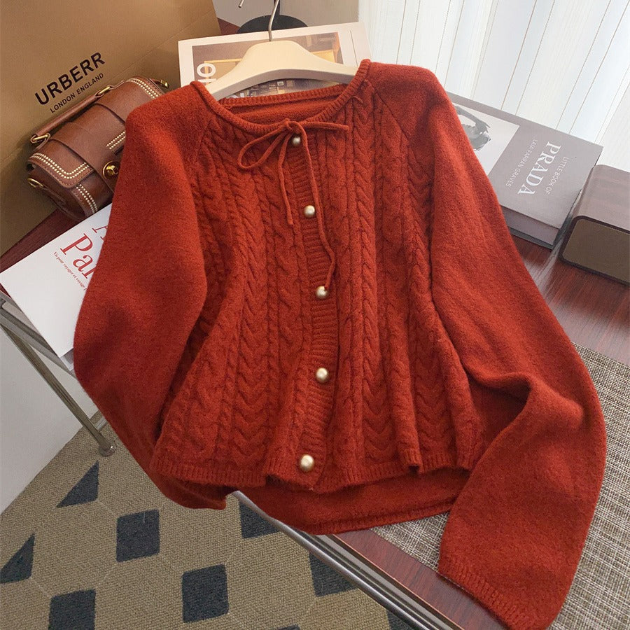 Women’s knitted jacket with embossed pattern and decorative button details Lune London