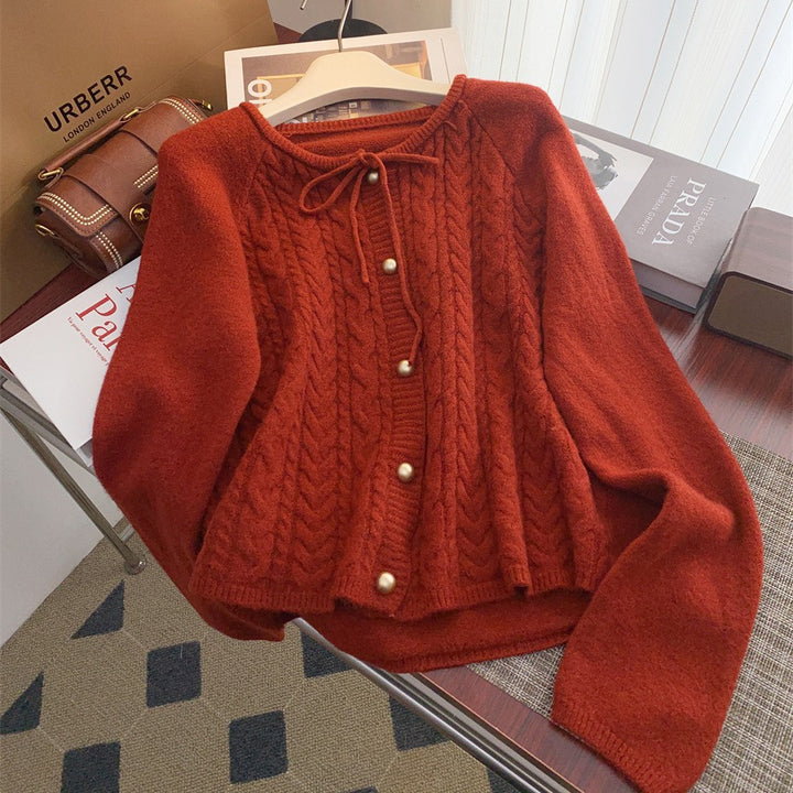 Women’s knitted jacket with embossed pattern and decorative button details Lune London