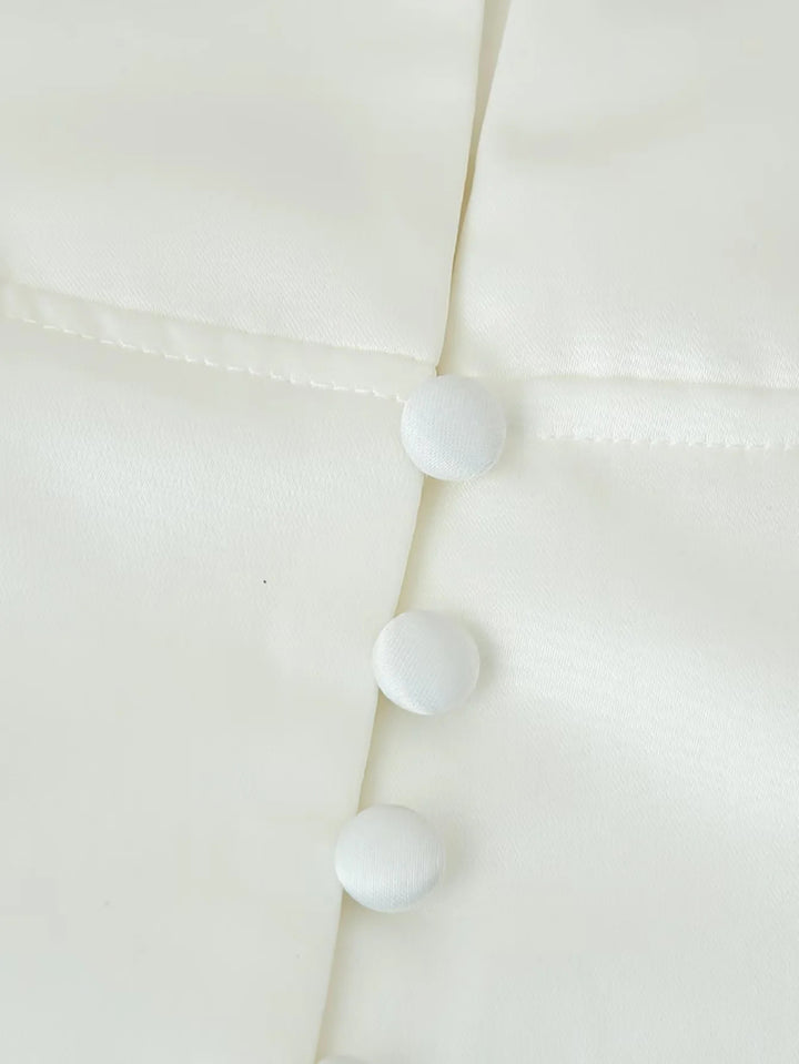 Fitted blouse for women with modern button details and a high collar Lune London