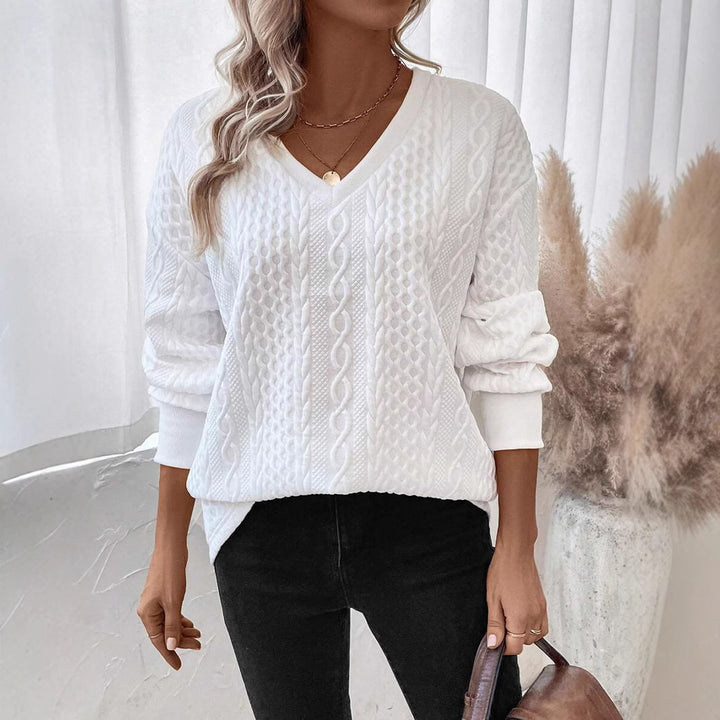 Knit sweater for women with a deep V-neck and a textured pattern Lune London