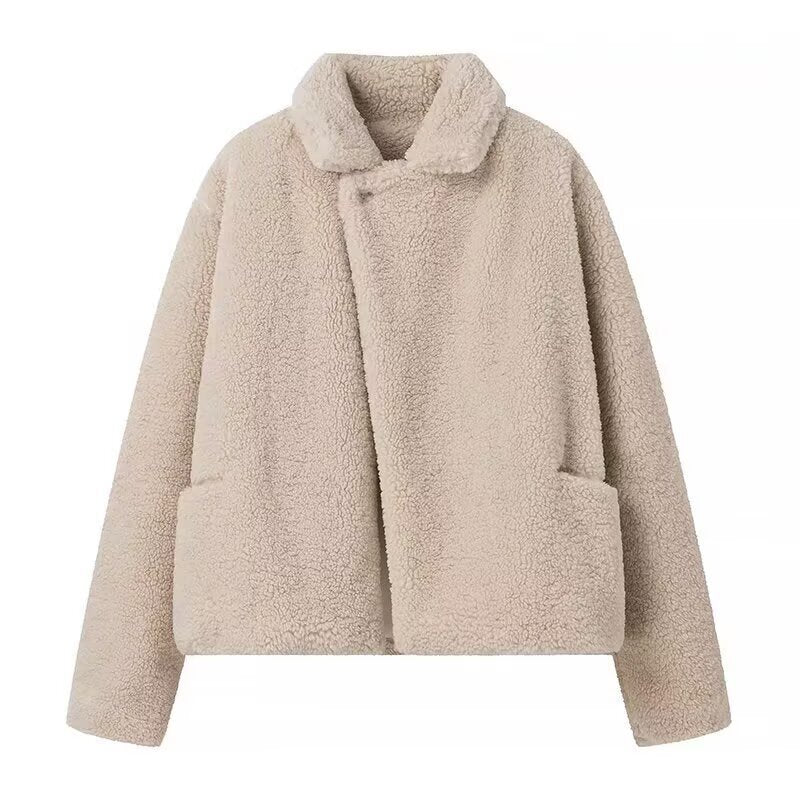 Fluffy teddy coat for women with elegant lapels and practical piped pockets Lune London