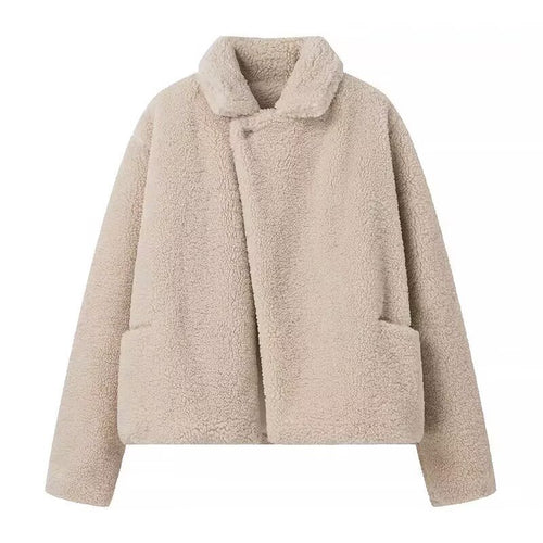 Fluffy teddy coat for women with elegant lapels and practical piped pockets Lune London