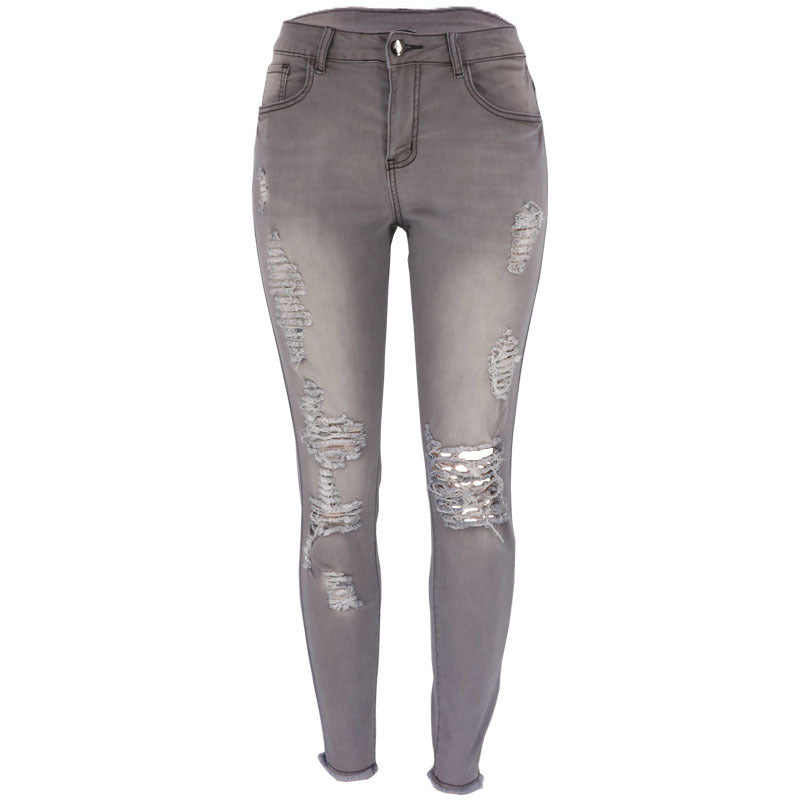 Jeans skinny pour femmes en look usé avec des déchirures marquées Lune London