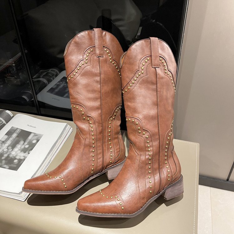 Ladies' cowboy boots with trendy stud accents and a comfortable block heel Lune London