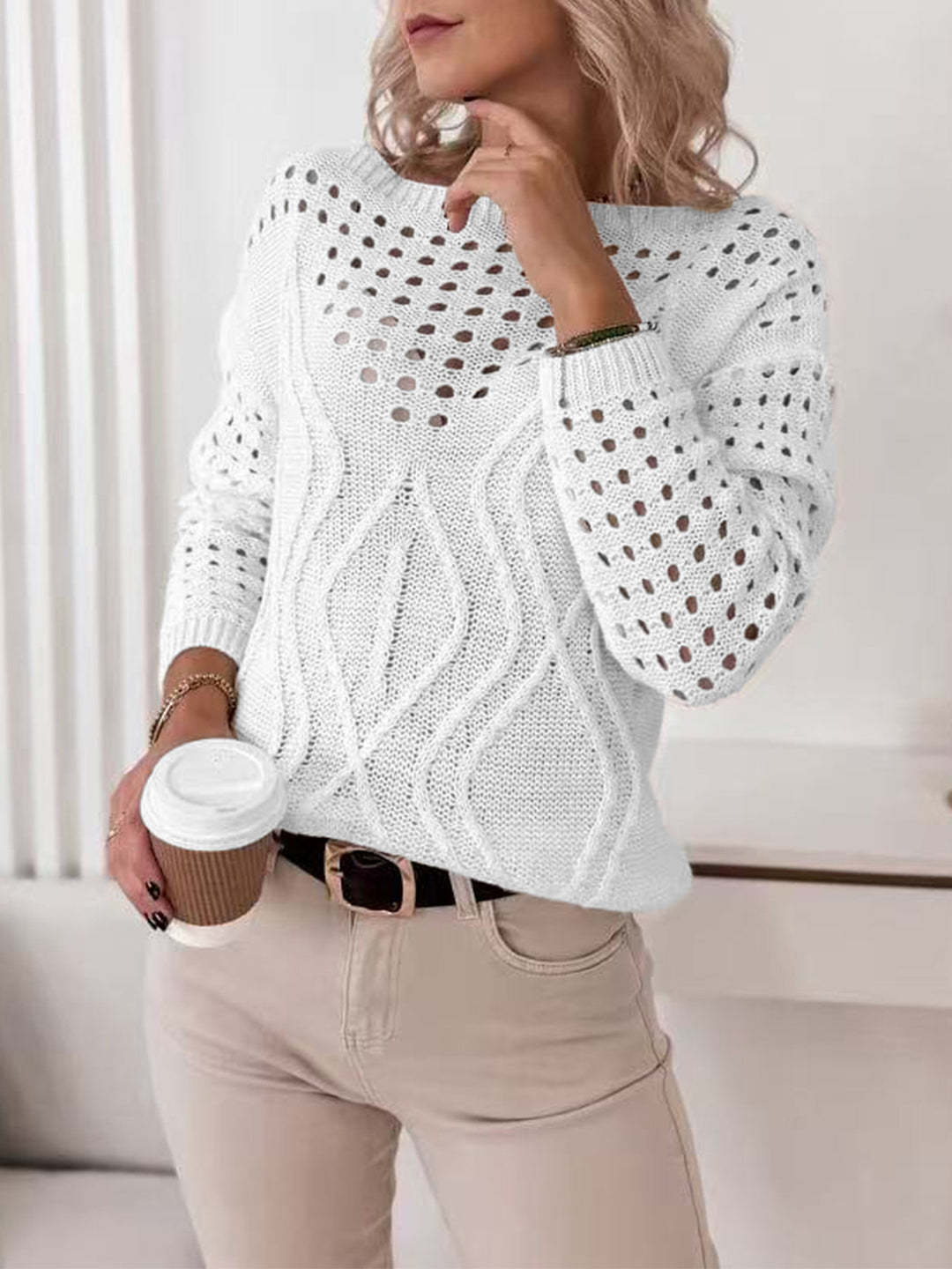 Women's knitted sweater with airy openwork patterns and a nice cable design Lune London