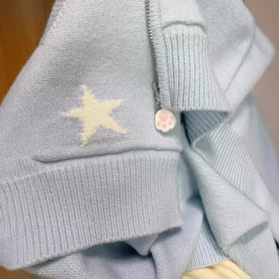 Hooded jacket for ladies with playful animal patterns and pom poms Lune London