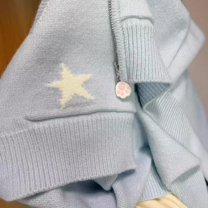 Hooded jacket for ladies with playful animal patterns and pom poms Lune London