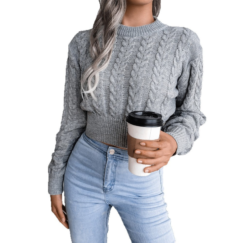 Chic and Style women's fashion sweater with twisted knit pattern and high cuffs
