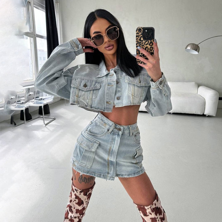 Women's cropped denim jacket with matching mini skirt in a modern utilitarian style Lune London
