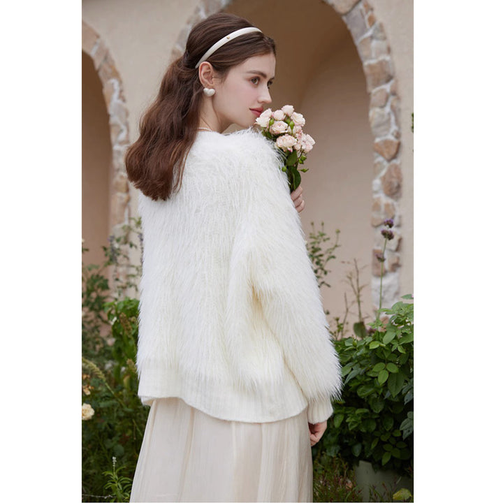Knitted jacket for women with fluffy sleeves and button closure Lune London
