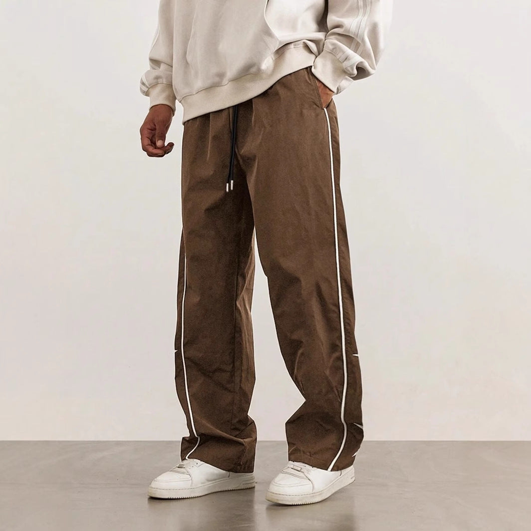 Sport leisure pants for men with chic and stylish side appliqués