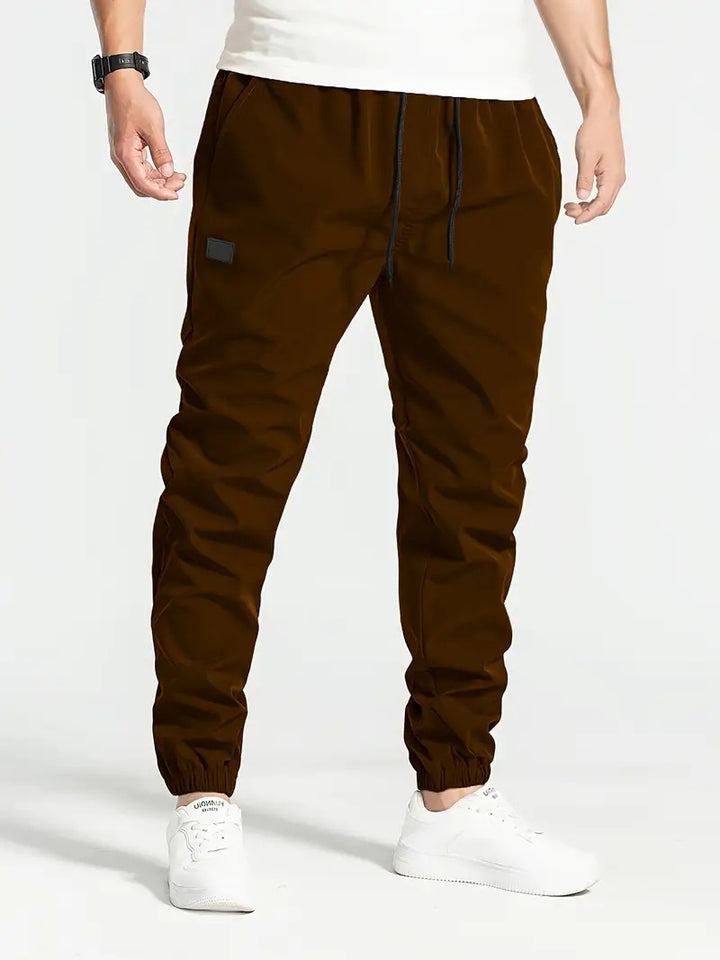 Casual men's jogger pants with elastic waist and practical side pockets Lune London