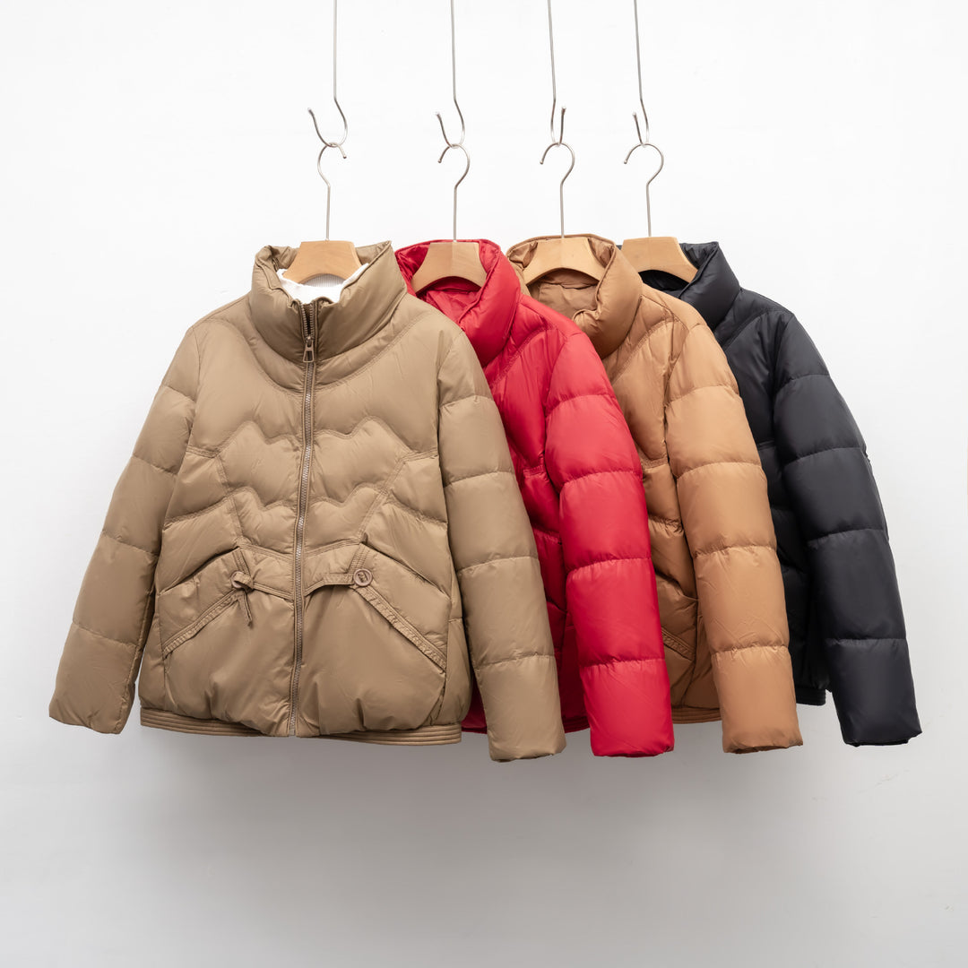 Quilted jacket for women with decorative button details and a high collar Lune London