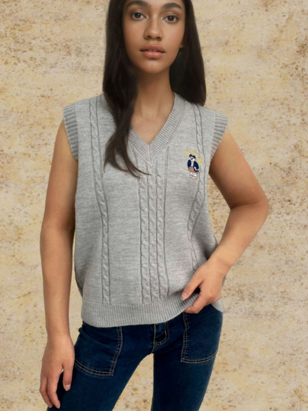 Knitted vest for women with V-neck and embossed pattern Lune London