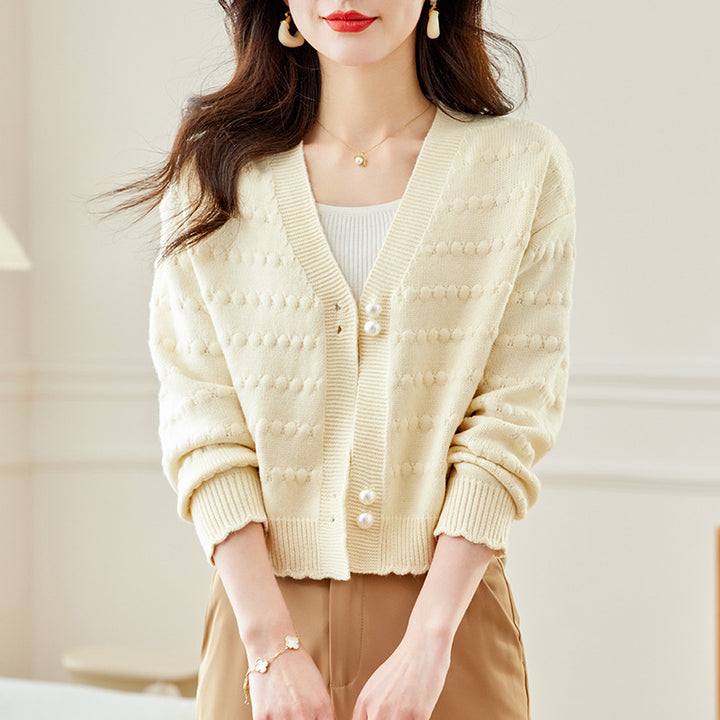 Ladies comfortable knit jacket with pearl adorned buttons and structured design Lune London