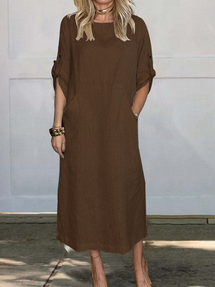 Airy midi dress for women with practical pockets and roll-up sleeves Lune London