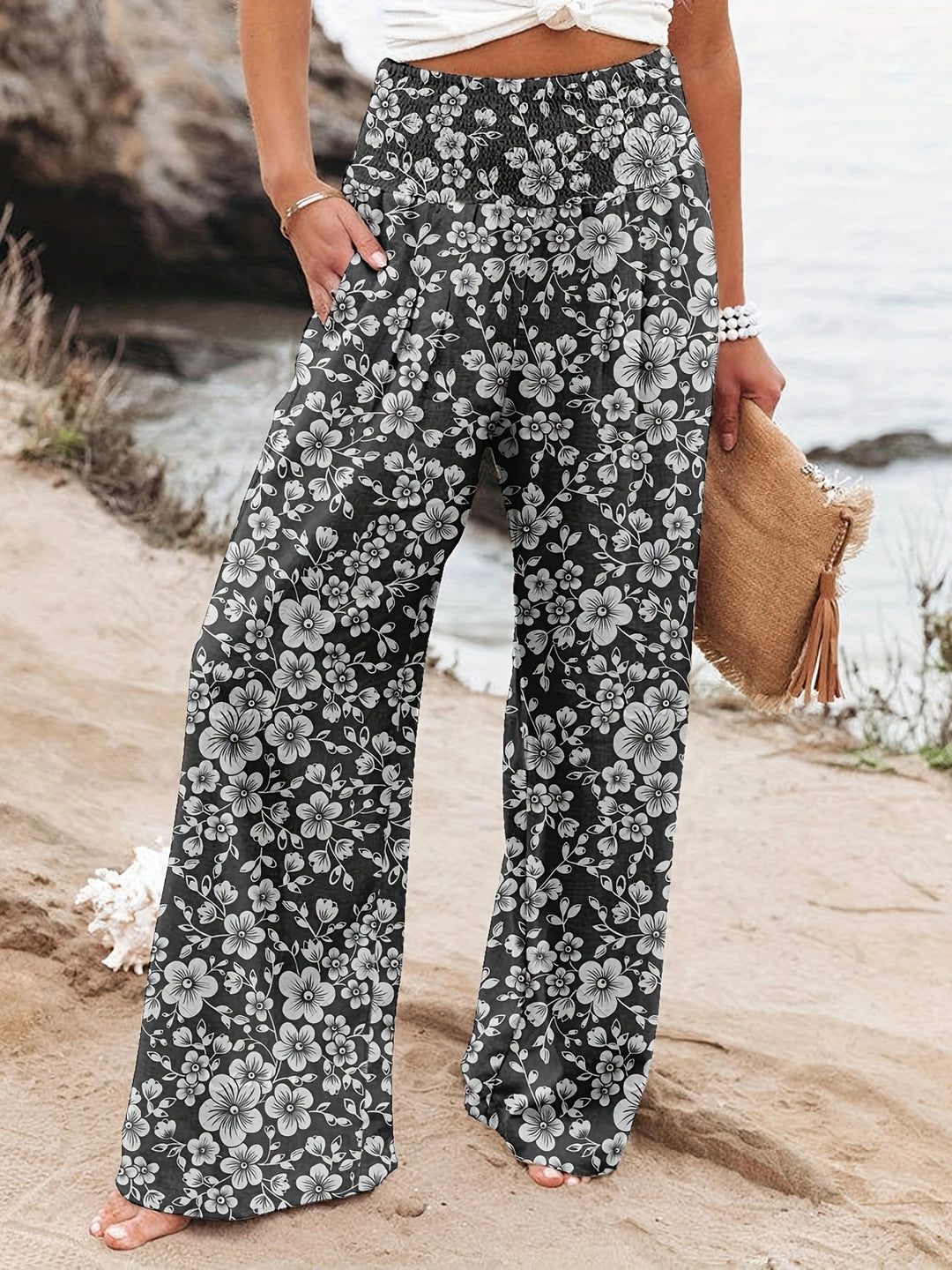 Loose summer pants for women with floral print and elastic waistband Lune London