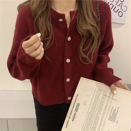 Cardigan pour femmes avec des détails de bouton sophistiqués et une coupe large Chic & Stil