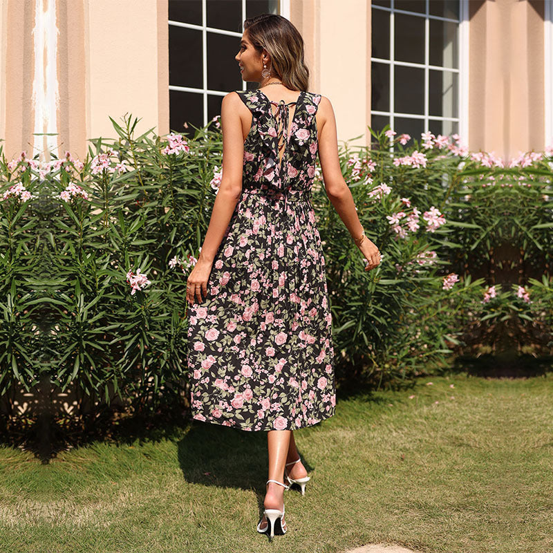 Maxi dress for women with floral pattern and button detail Lune London