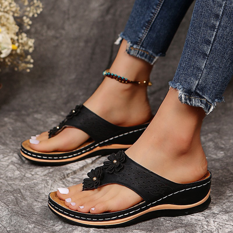 Strappy sandals for ladies with an elegant floral appliqué and anatomical foot support Lune London