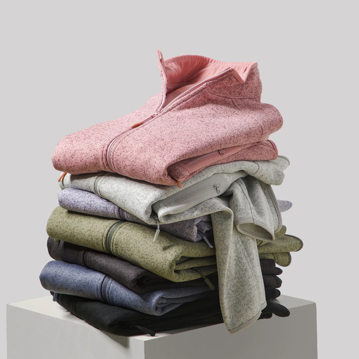 Veste en polaire pour femmes avec poches latérales zippées et col haut Chic & Stil
