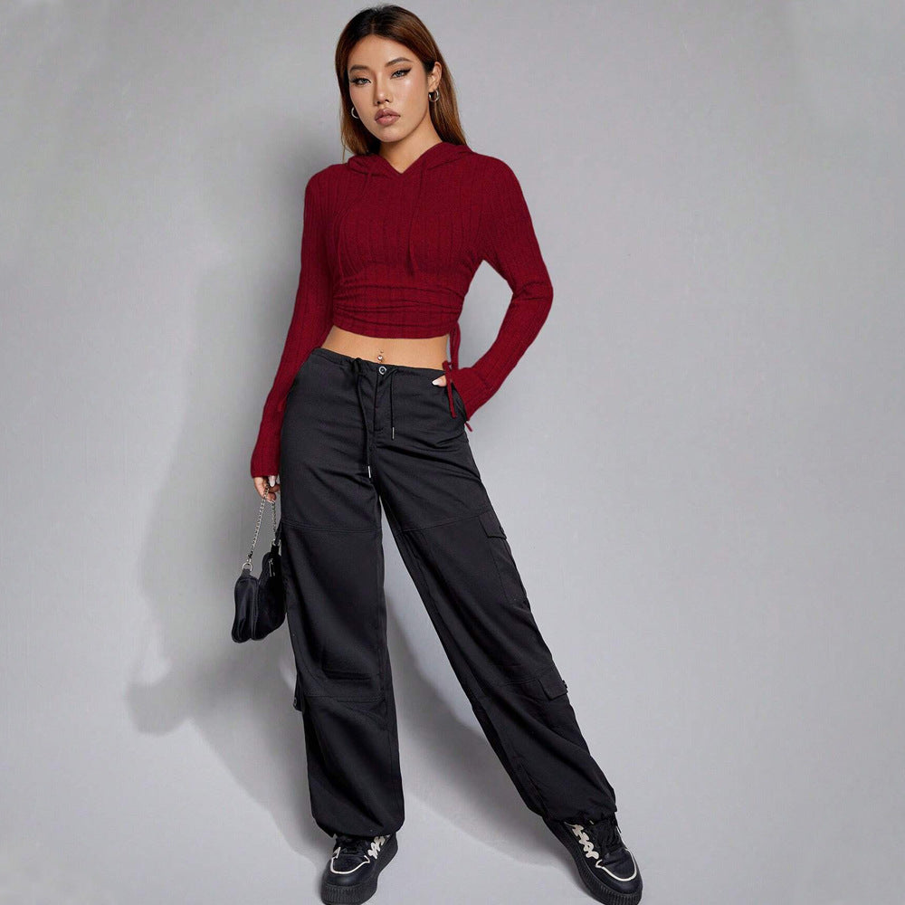 Chic & Stil Women's Cropped Long Sleeve Hooded Top with Elegant Ribbed Pattern