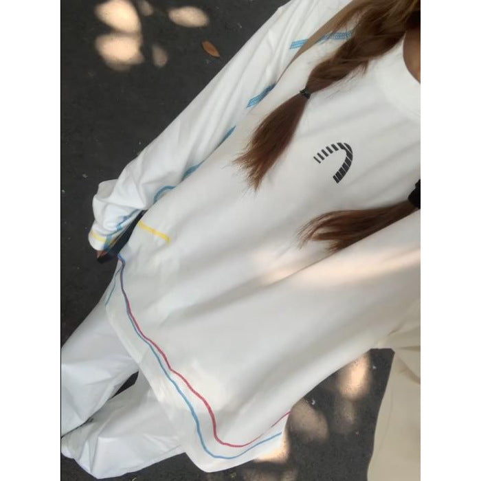 Women's casual oversized sweatshirt with colorful accent stripes Chic & Stil