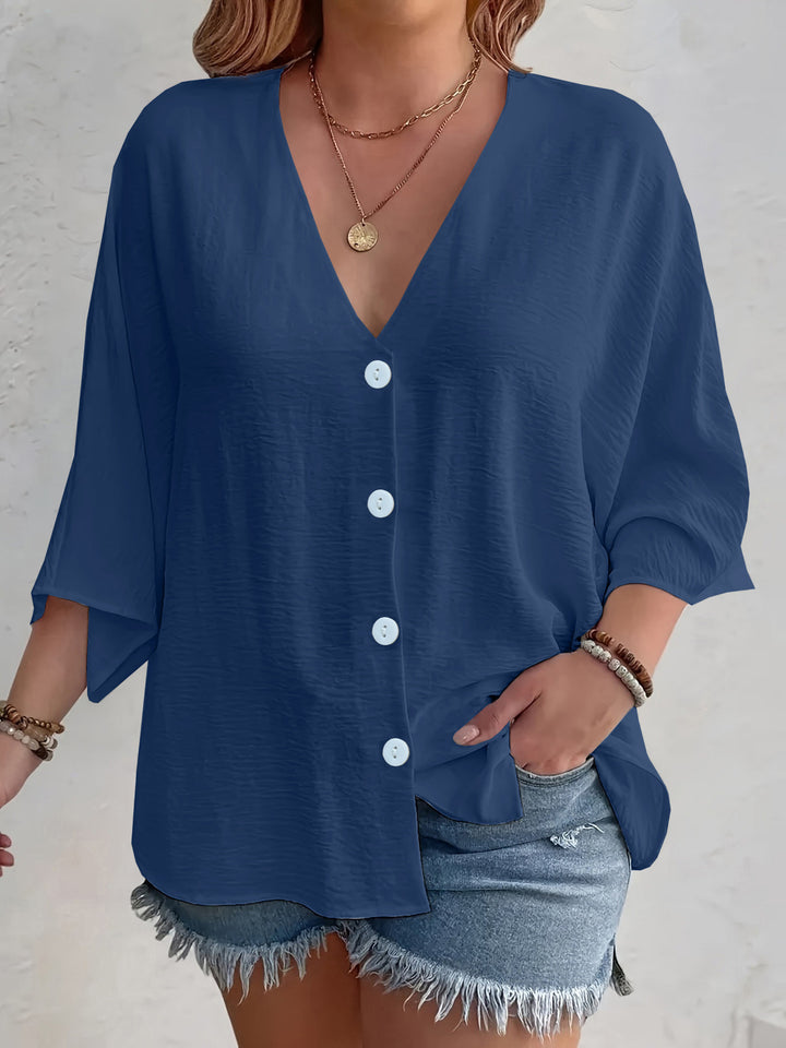 Short-sleeved advantageous blouse for ladies with button placket and V neckline Lune London