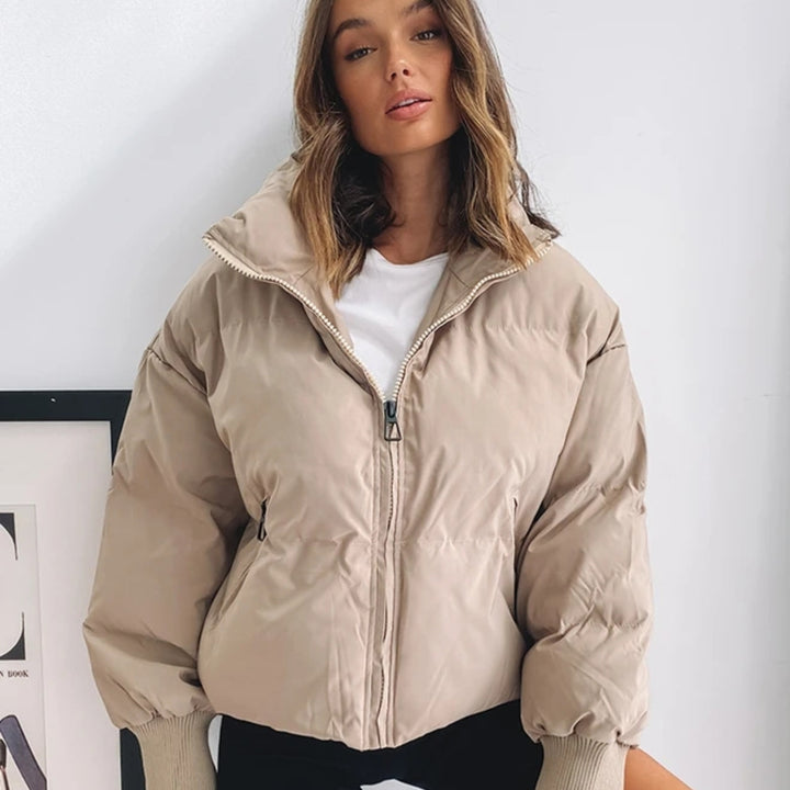 Women's casual quilted jacket with hood and elastic cuffs Chic & Stil