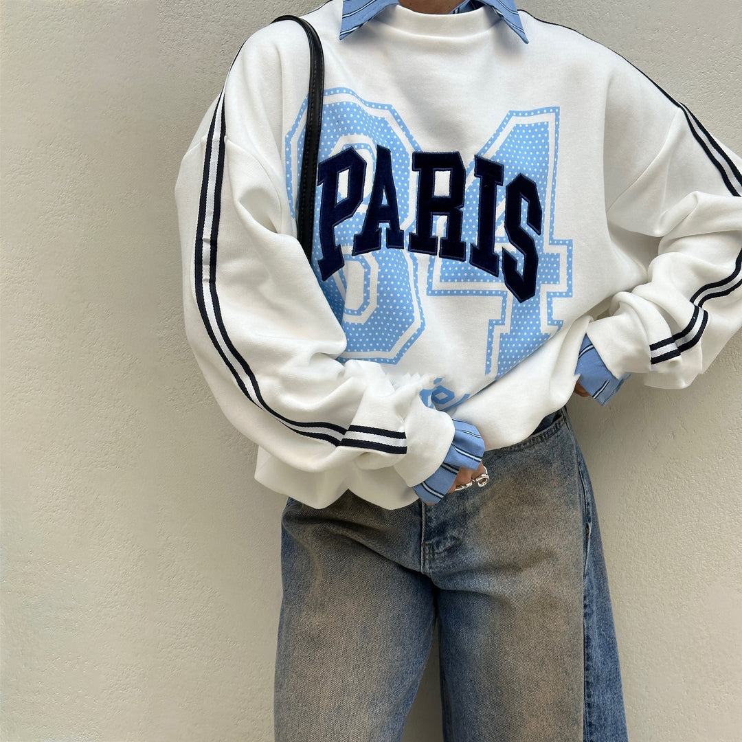 Oversized sweatshirt for women with Paris fashion print and striped accents Lune London