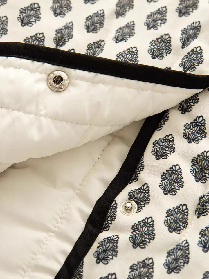 Ladies quilted jacket with decorative pockets and modern print Lune London