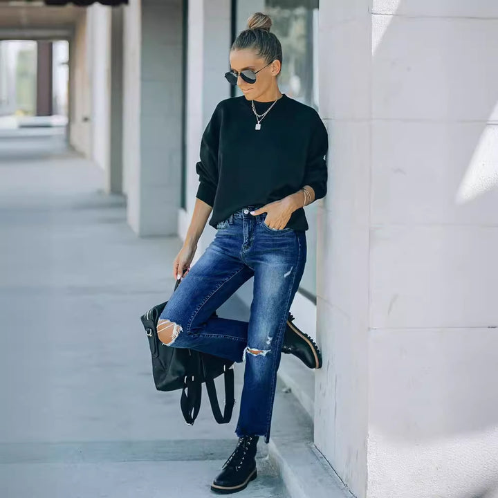 Modern high-waisted jeans for women with a chic and stylish worn look