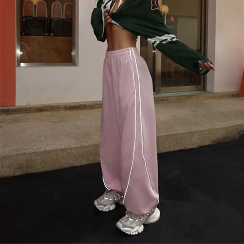 Casual sports pants for women with side stripes and practical pockets Lune London