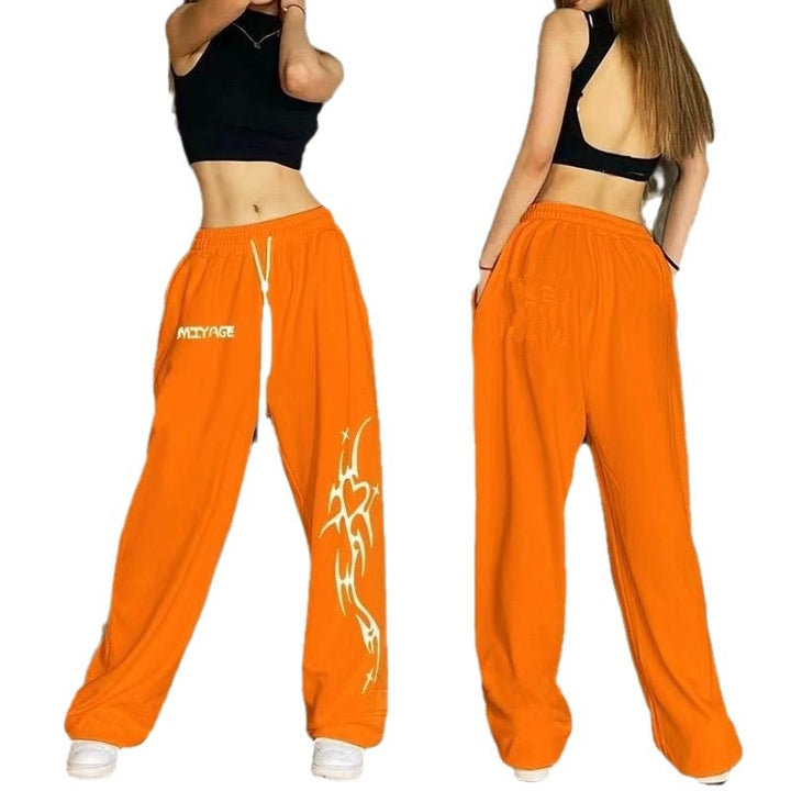 Women's casual leisure pants with a wide cut and striking graphic design Chic & Stil