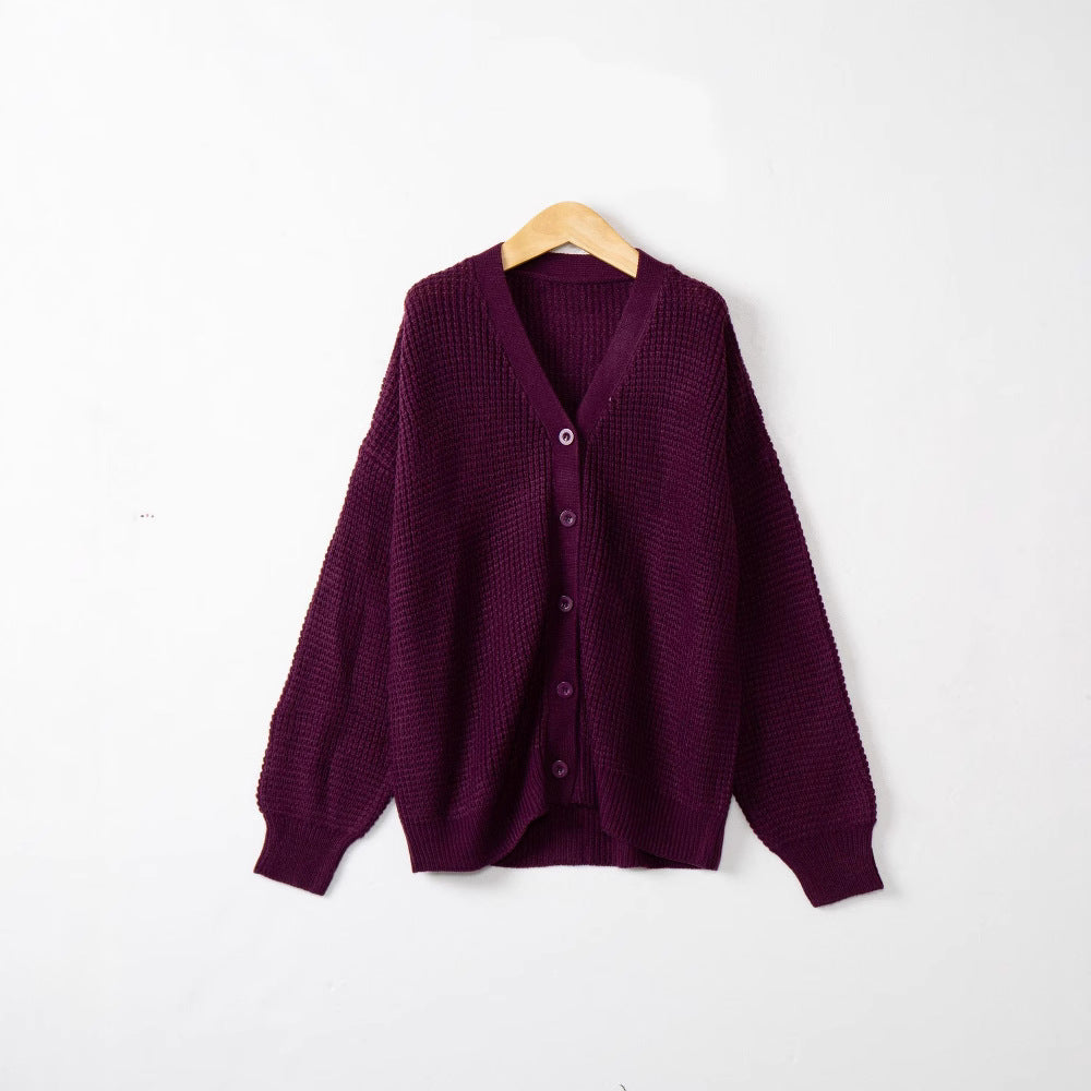 Women's knitted jacket with structured pattern and practical button details Lune London