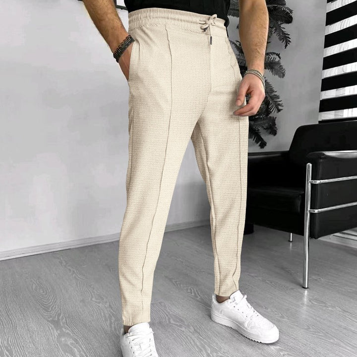 Luxury men's pants with elastic drawstring and textured design Lune London