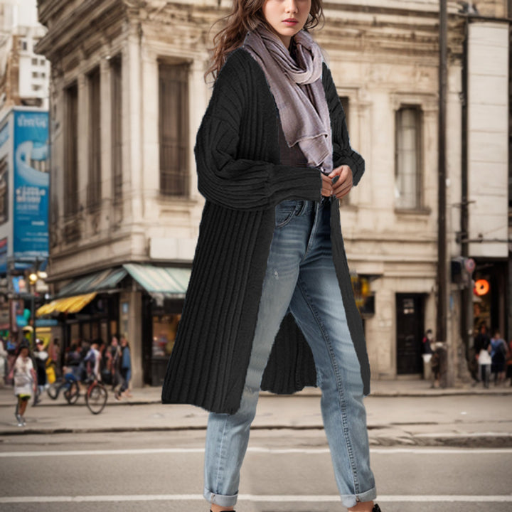 Ladies Long knit coat with elegant ribbed structures and a loose fit Chic and Still
