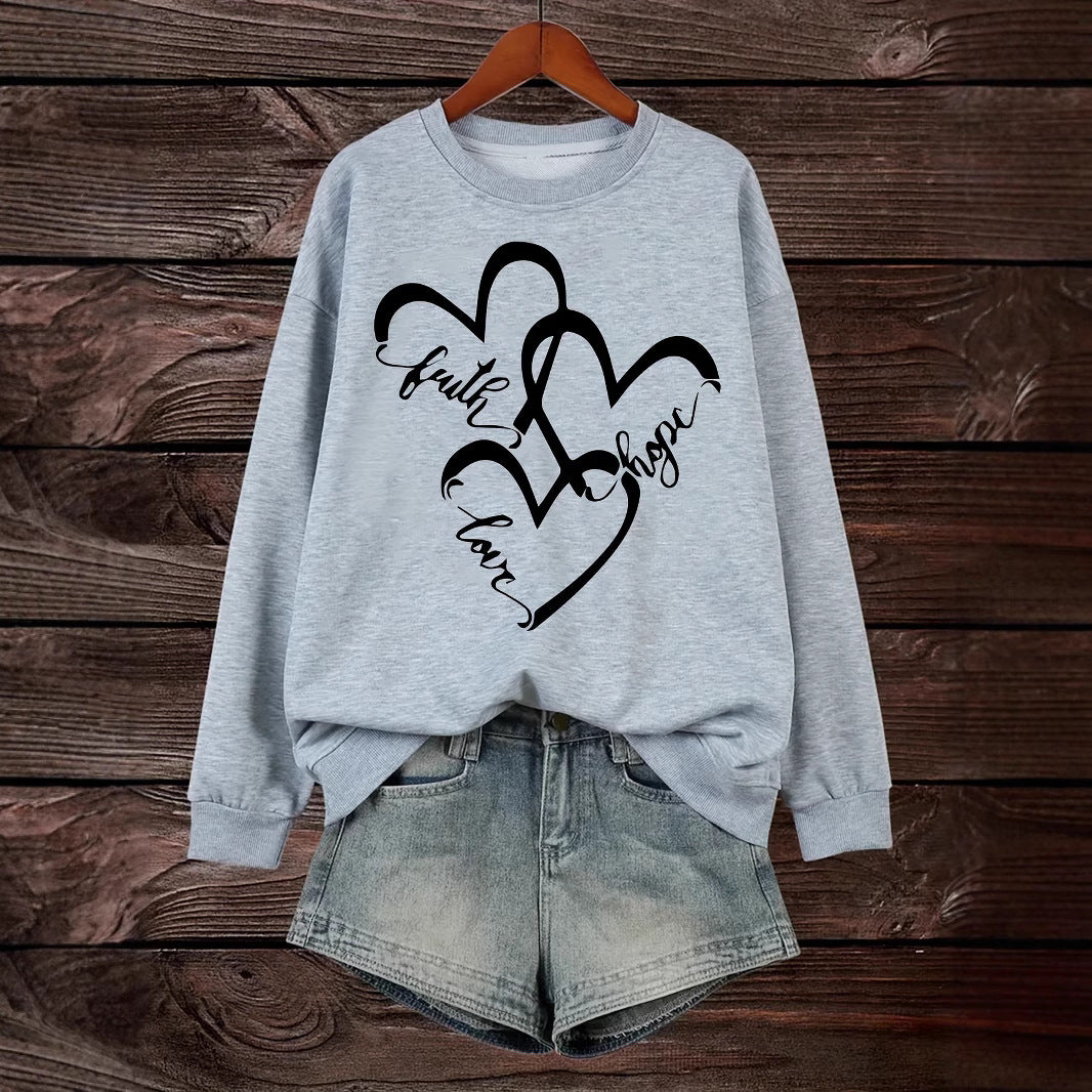 Sweatshirt pour femmes avec motif de cœur romantique et impression inspirante Chic & Stil