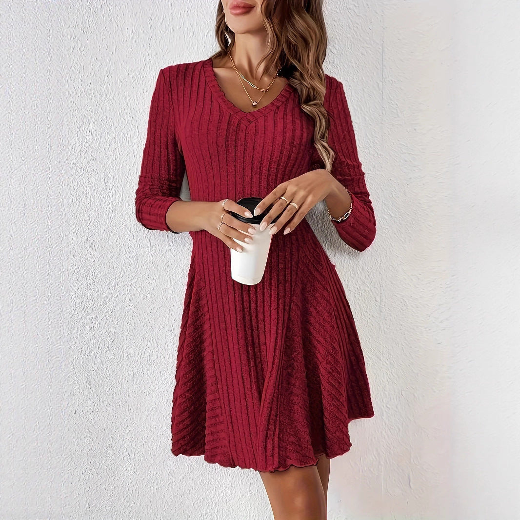V neck dress for women with flared hem and long sleeves Lune London